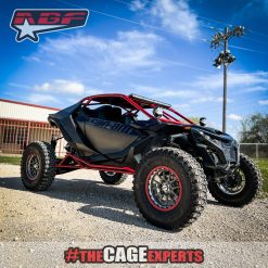can am maverick R with Red tree kickers and roll cage
