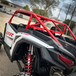 2024 rzr xp 1000 with red aftermarket roll cage