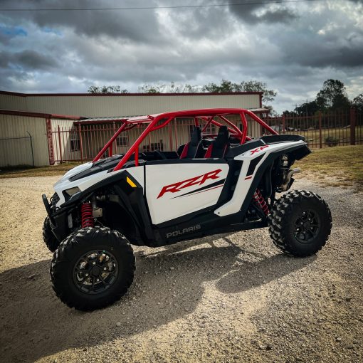 2024 rzr xp 1000 with red aftermarket roll cage