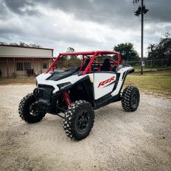 2024 rzr xp 1000 with red aftermarket roll cage