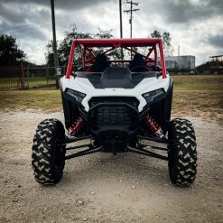 2024 rzr xp 1000 with red aftermarket roll cage