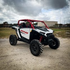 2024 rzr xp 1000 with red aftermarket roll cage