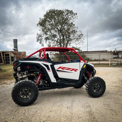 2024 rzr xp 1000 with red aftermarket roll cage