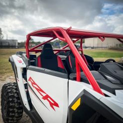 2024 rzr xp 1000 with red aftermarket roll cage