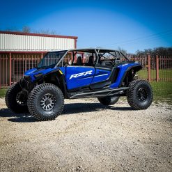 Blue rzr xp 4 seat with aftermarket rollcage