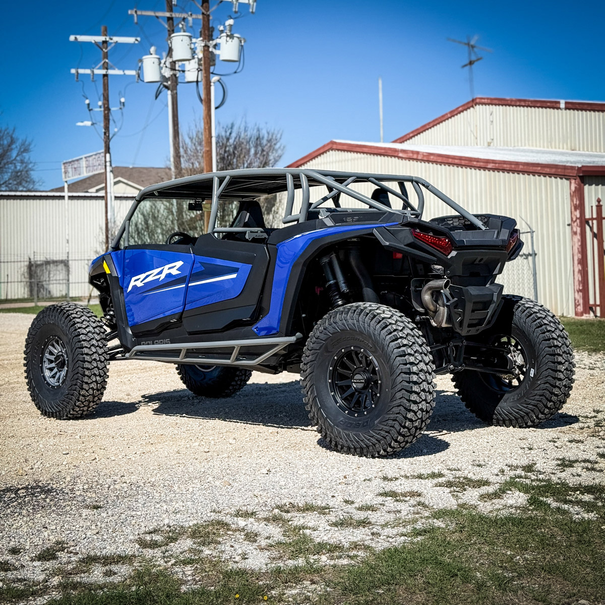Blue rzr xp 4 seat with aftermarket rollcage