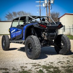 Blue rzr xp 4 seat with aftermarket rollcage