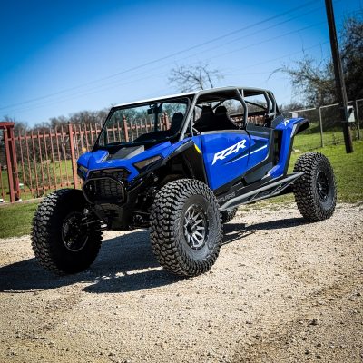 Blue rzr xp 4 seat with aftermarket rollcage