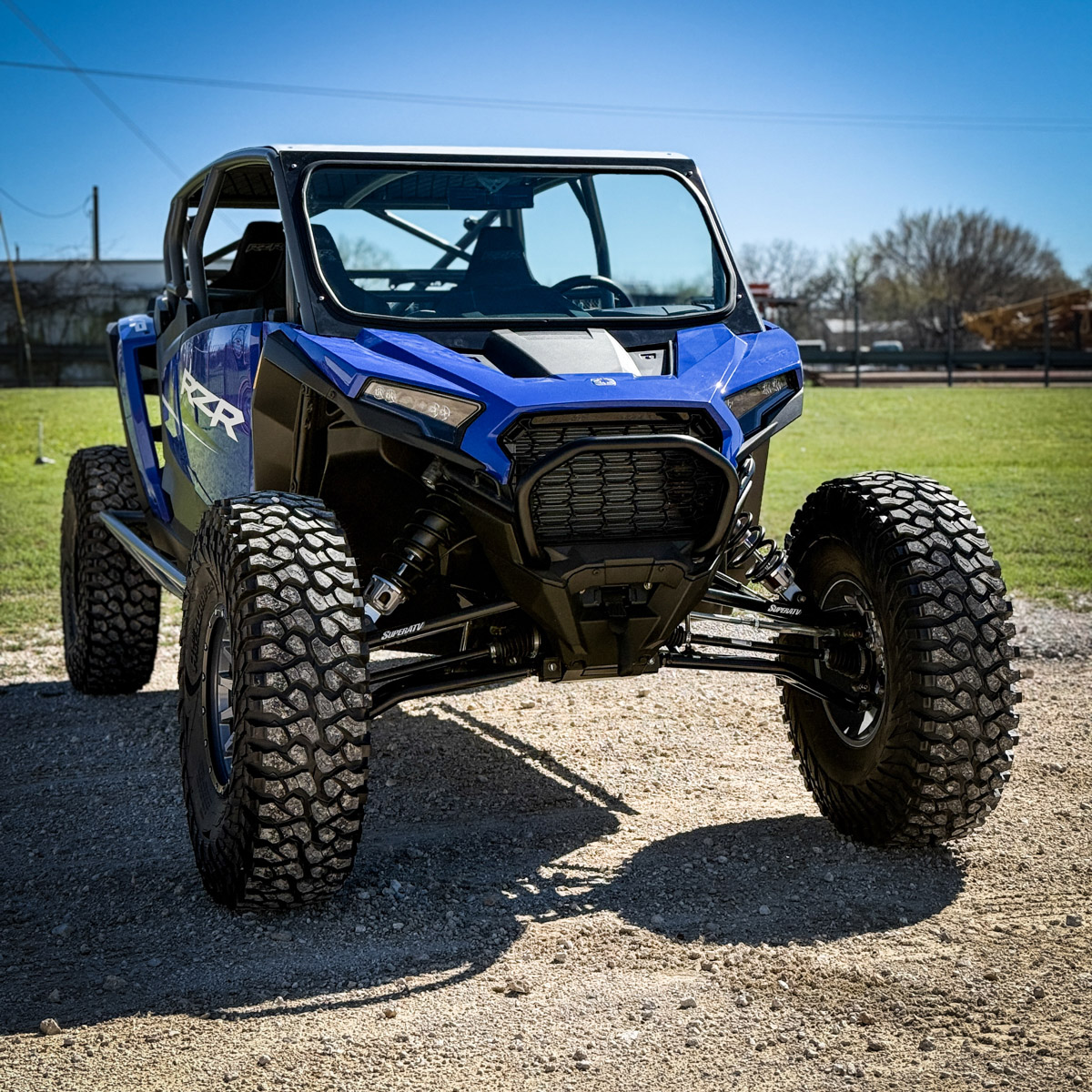 Blue rzr xp 4 seat with aftermarket rollcage